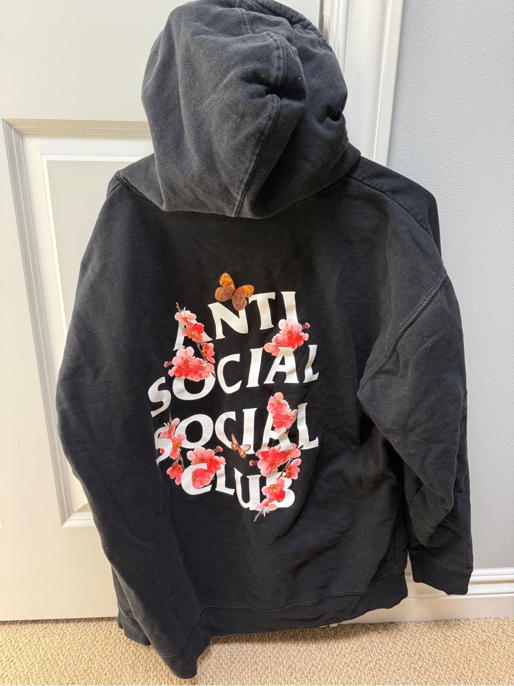 Anti Social Social Club Black Hoodie with White Logo and Pink Floral Accents